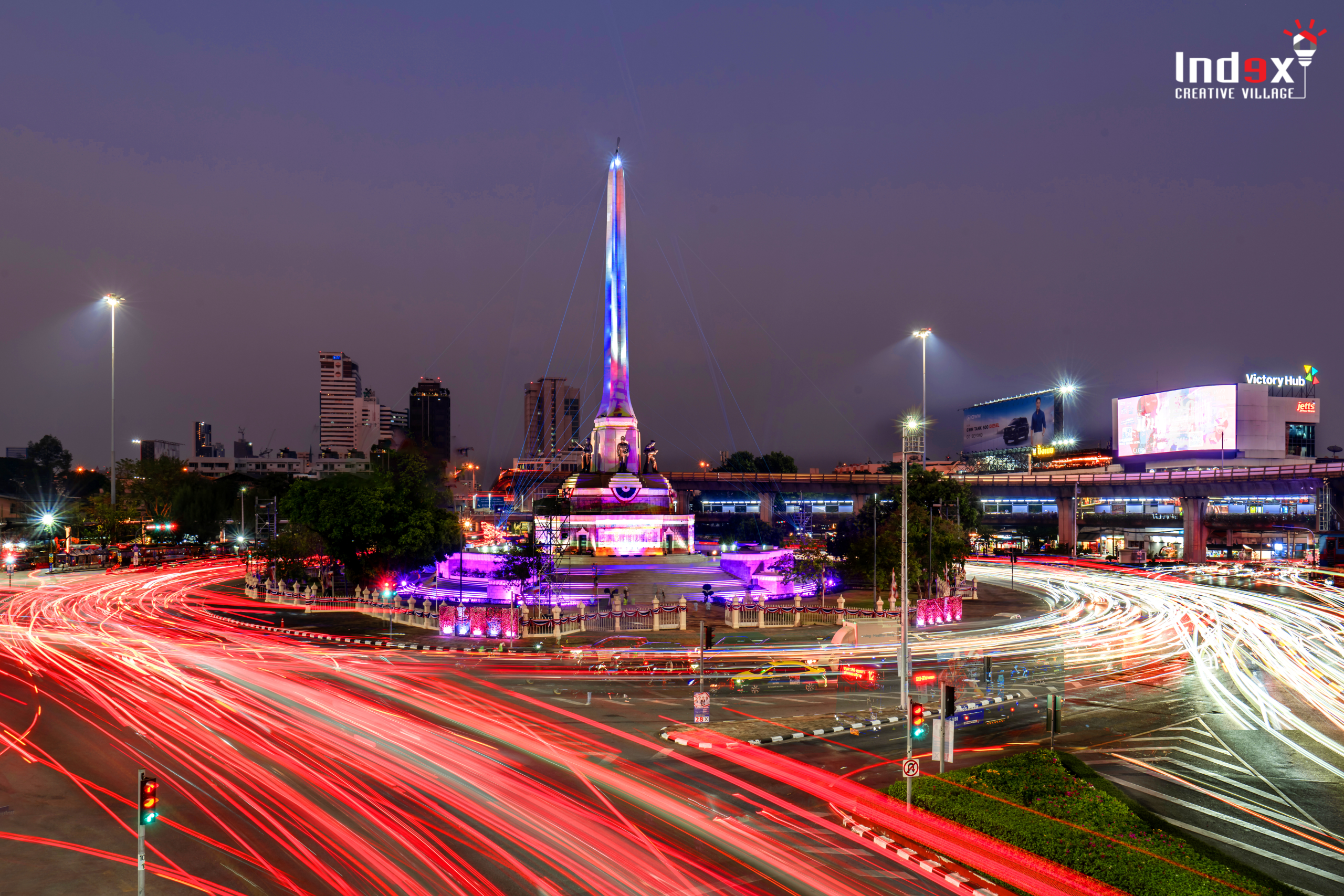 Event production lighting installation illuminating Victory Monument in Bangkok
