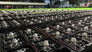 Drones arranged in a grid formation before the show begins