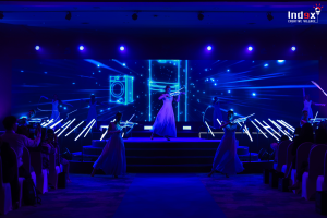 Stage performance with LED visual screen and lighting design as part of professional event production