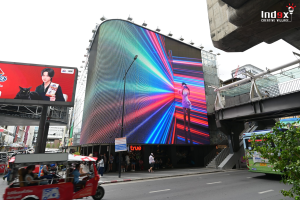 Large LED billboard displaying digital content to create a phygital public experience